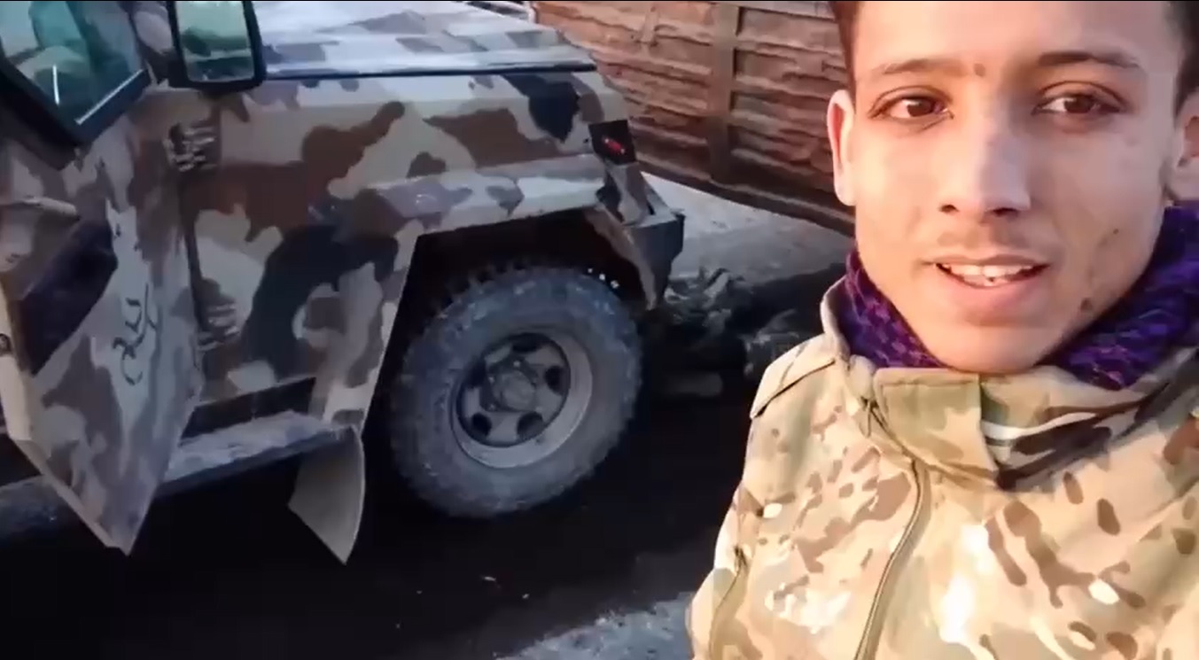 Deliberate Crushing of the Bodies of Kurdish Fighters by an Armored Vehicle Belonging to the “Syrian Arab Army”